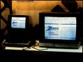 在 Zenith Z-100 上运行的 Text 和 Art（2）；MS-DOS、Art（1）和最小化运行的 Calendar（日历）